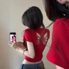 Southeast Asian cross-border women's clothing, red cutout backless bow short-sleeved T-shirt, slimming, sexy, unique and beautiful top details Picture